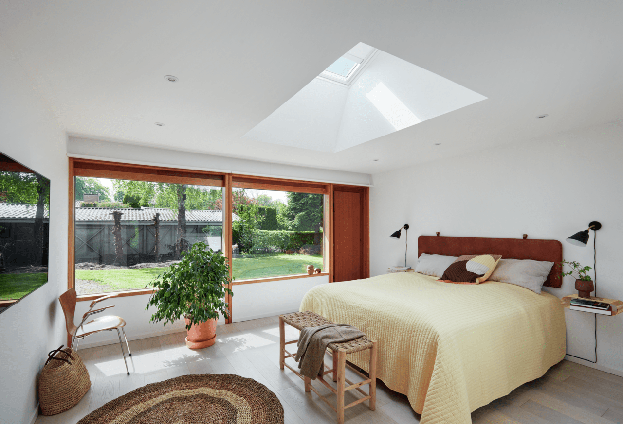 Bright bedroom with VELUX flat roof window