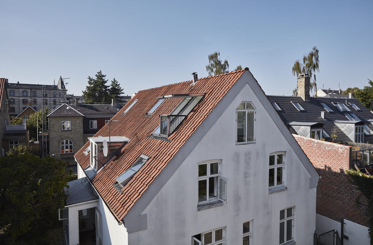 House with VELUX roof window and roof balcony