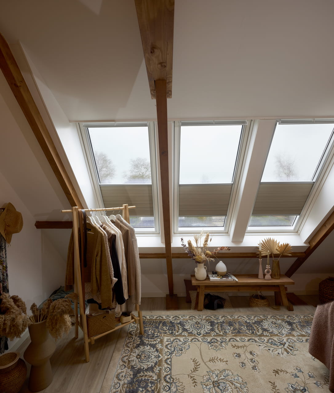 A living room area with 2 roof windows