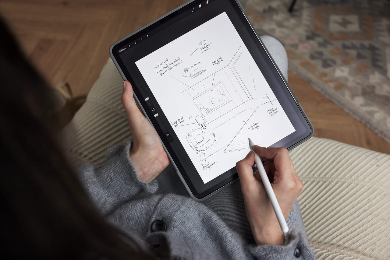 Woman drawing on her tablet