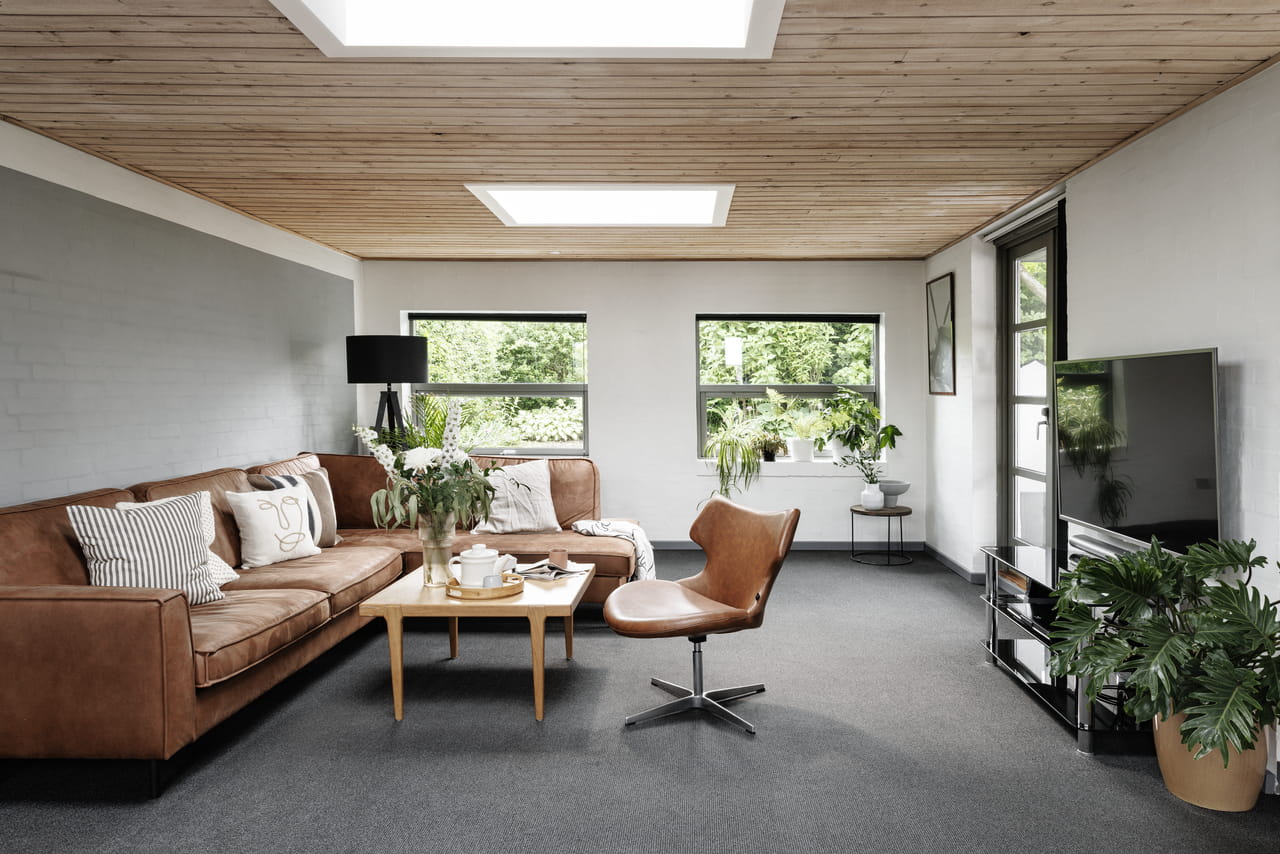 Livingroom with VELUX flat roof window