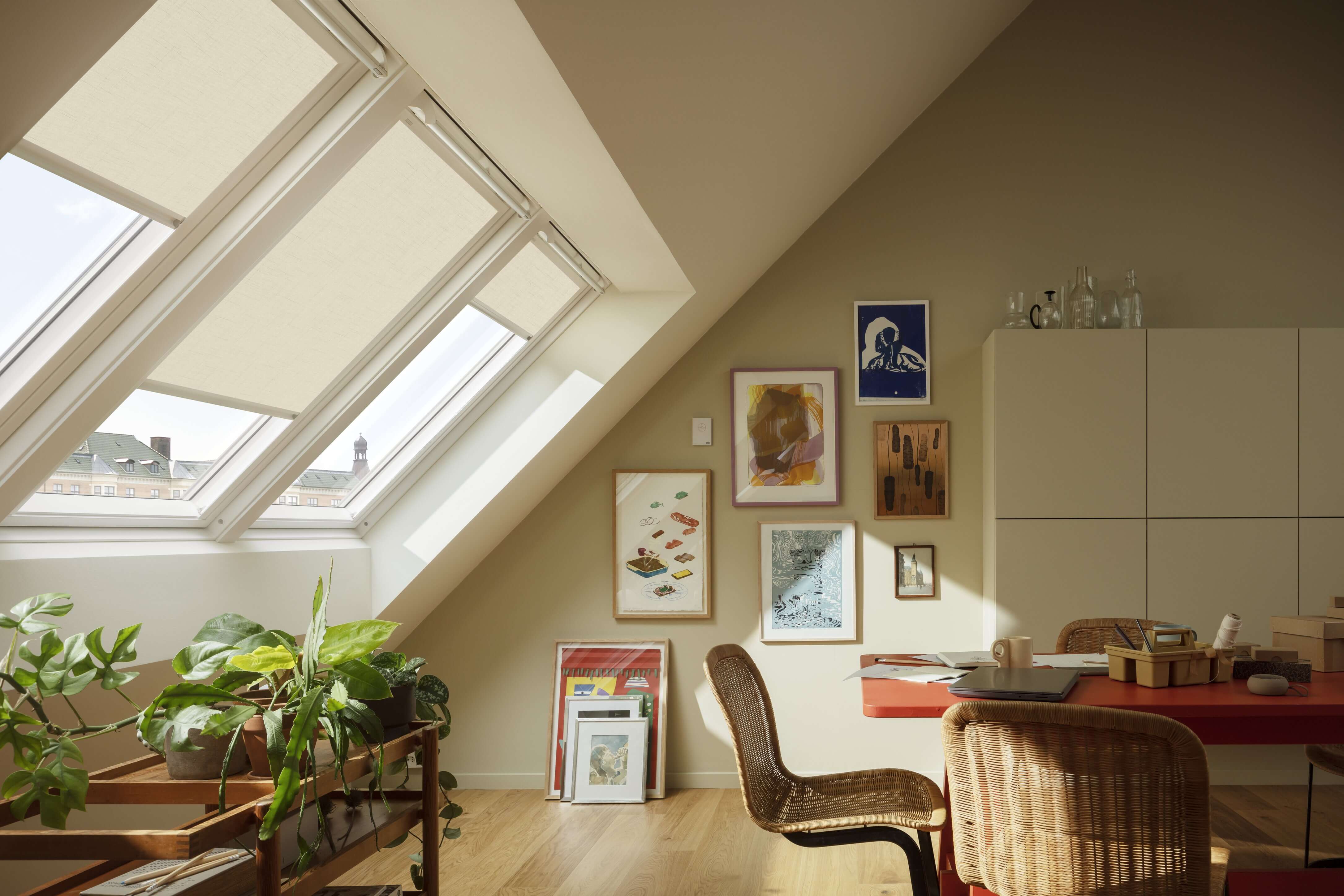 A room with VELUX 3in1 roof windows