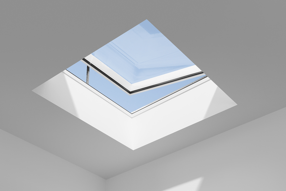 Corner of the opened roof window where you can see the sky.
