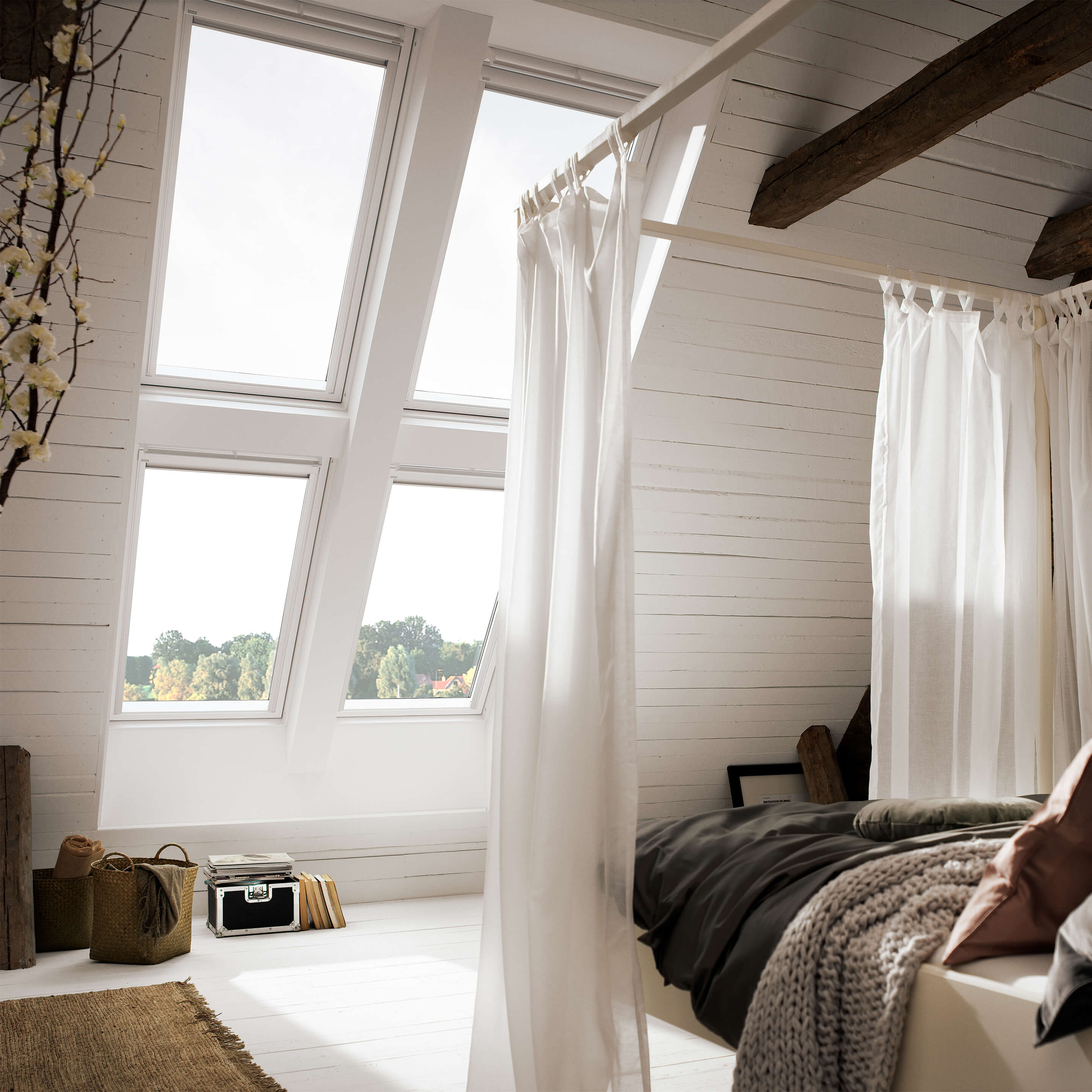 VELUX quattro multiple roof window solution interior view in bedroom