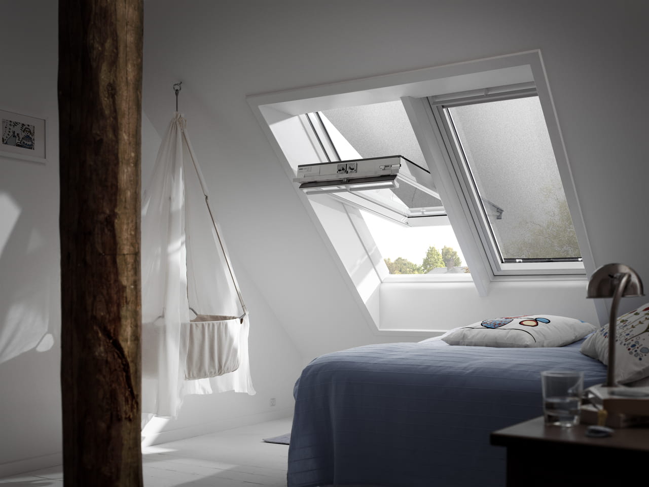 Bedroom image of 2 windows with VELUX anti-heat blinds installed
