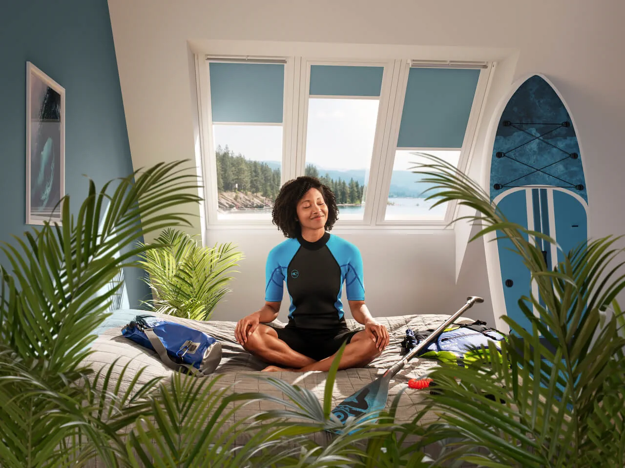 Woman sitting on the bed in a yoga position.