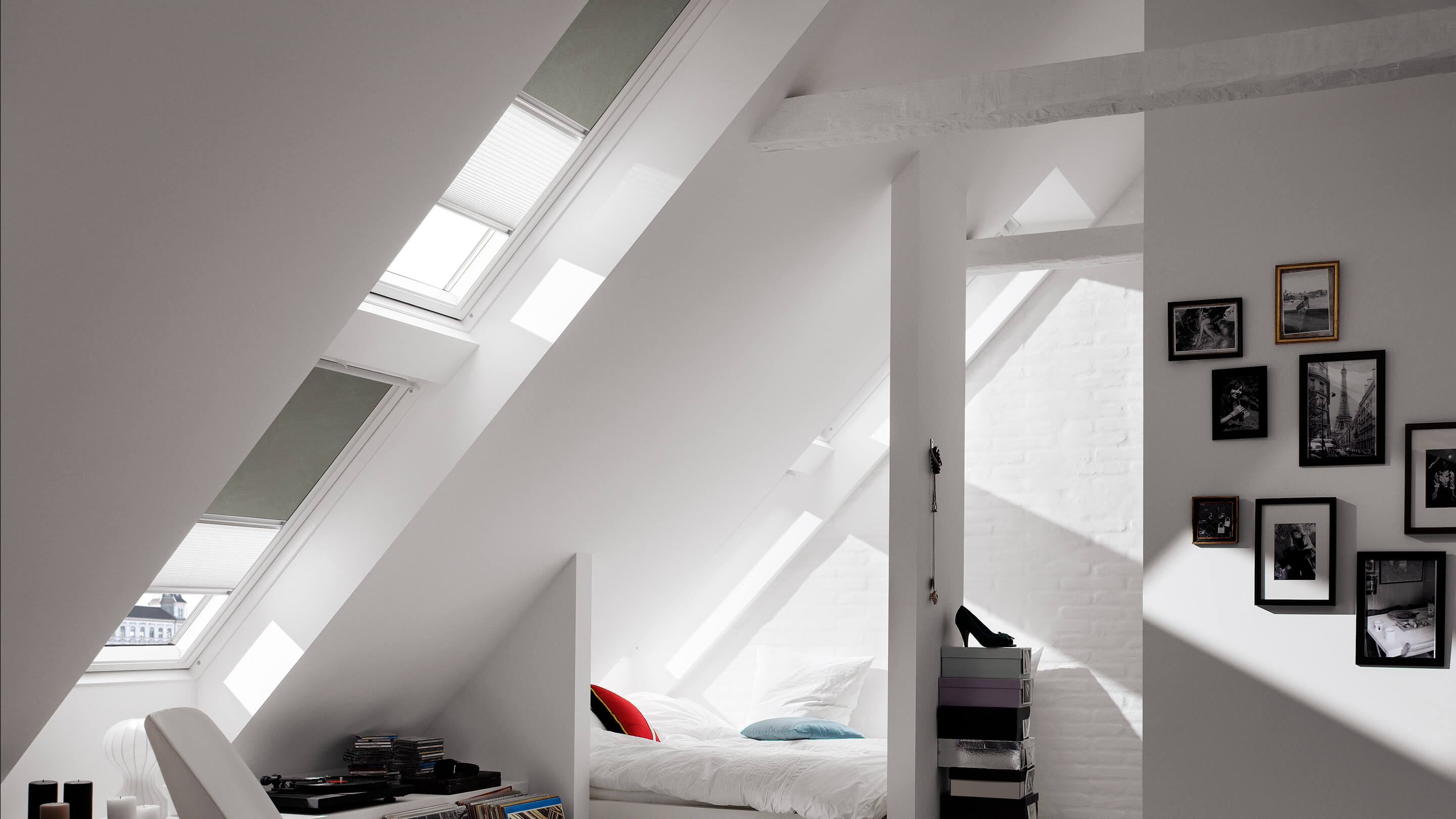 VELUX duo blackout roller blind for roof windows installed in multiple VELUX roof windows seen from the inside