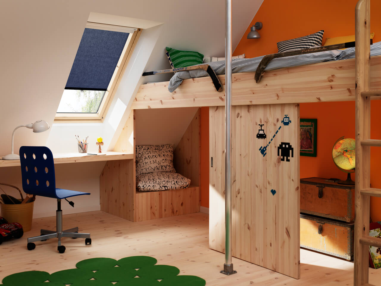 Kids room with orange wall and a VELUX roof window with dark blue translucent roller blind