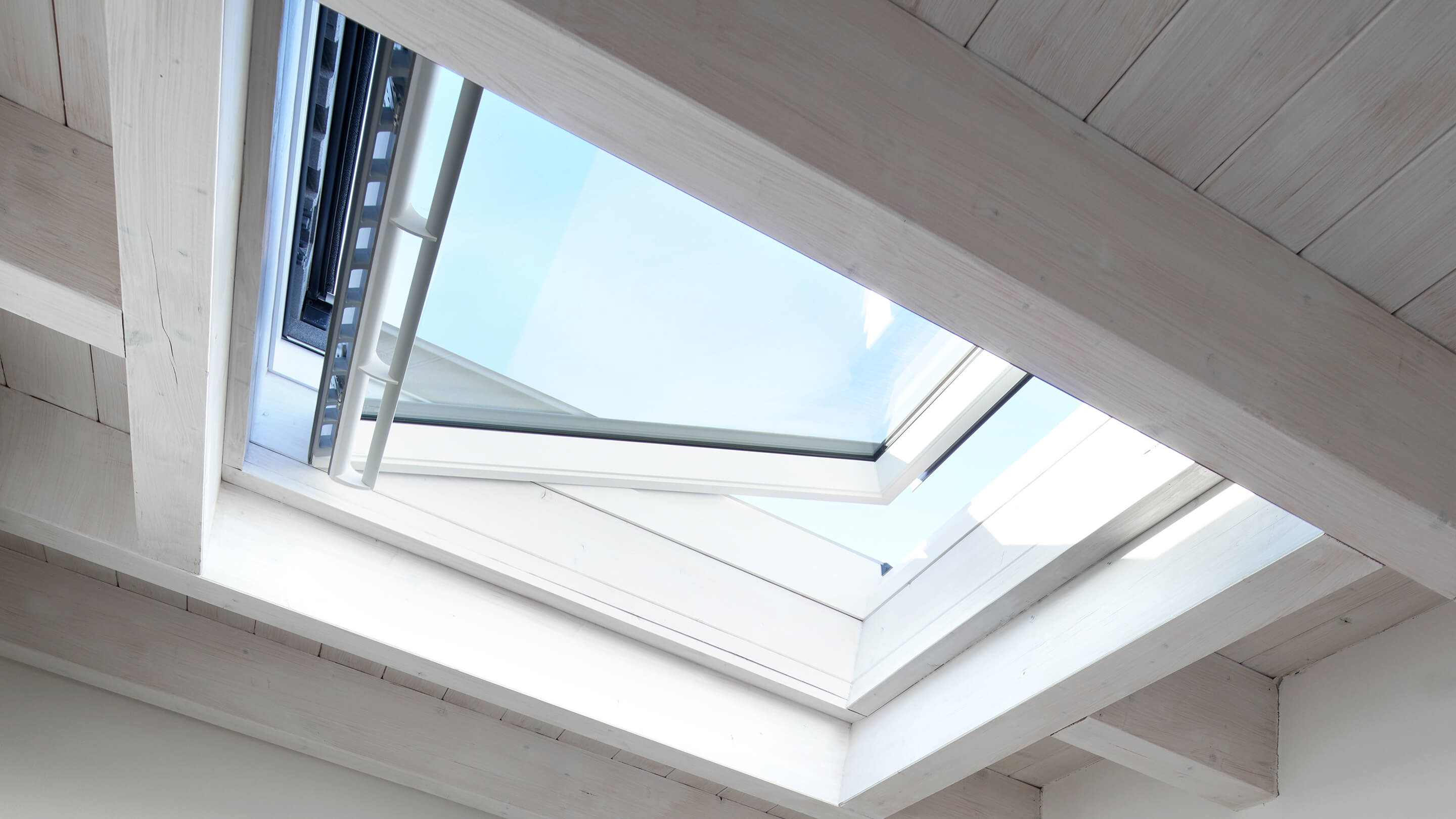 VELUX electric roof window for low pitch roofs inside view