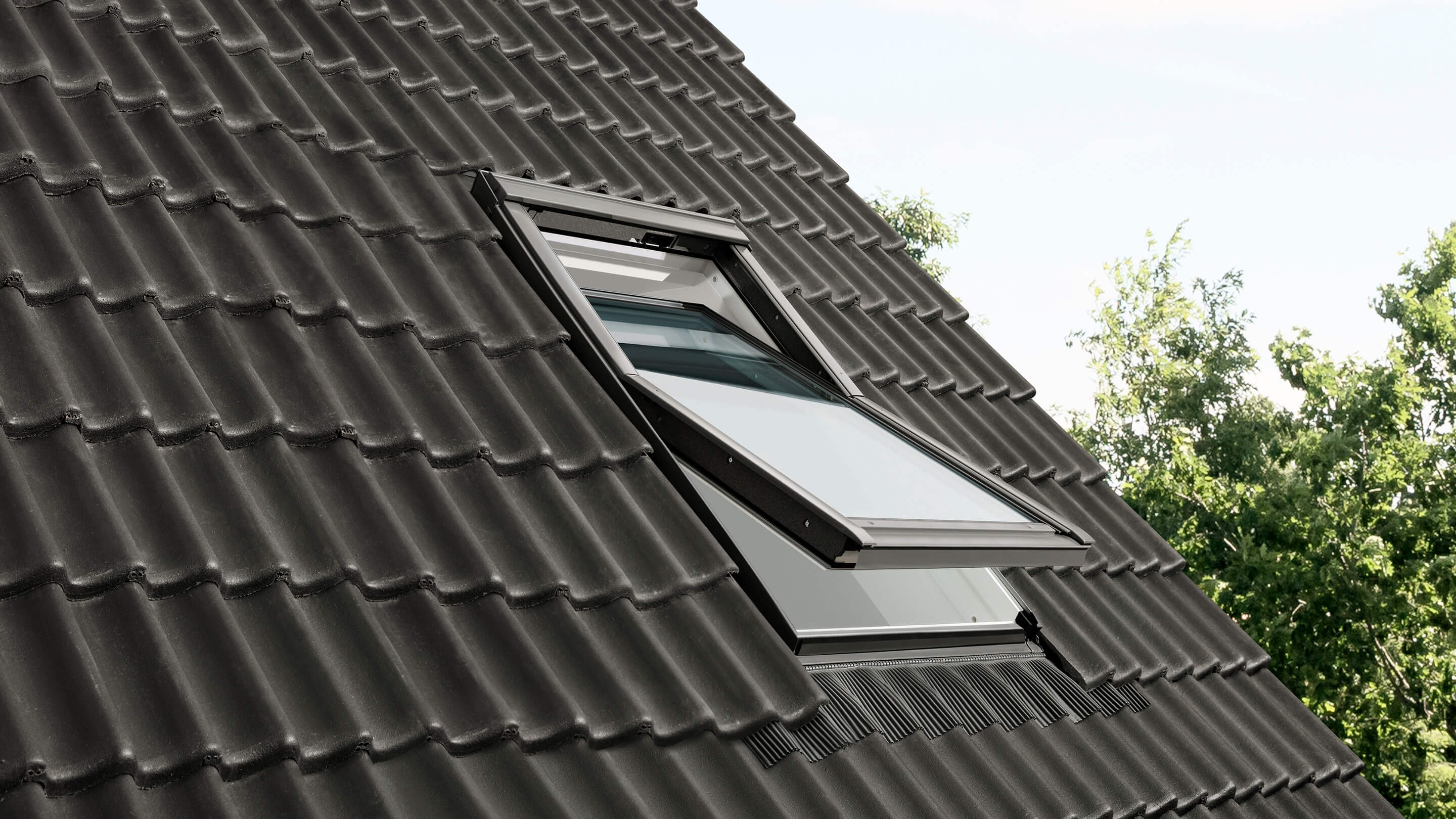 VELUX standard single roof window in tiled roof outside view