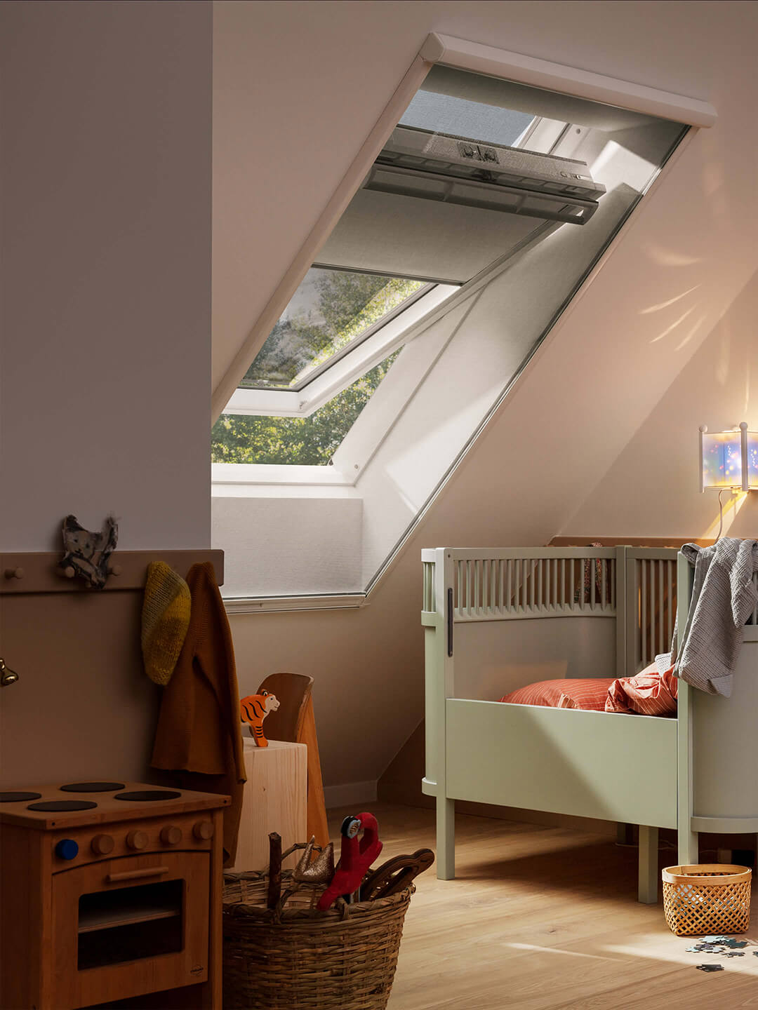 VELUX single standard roof window with blackout roller blinds viewed from a kids room