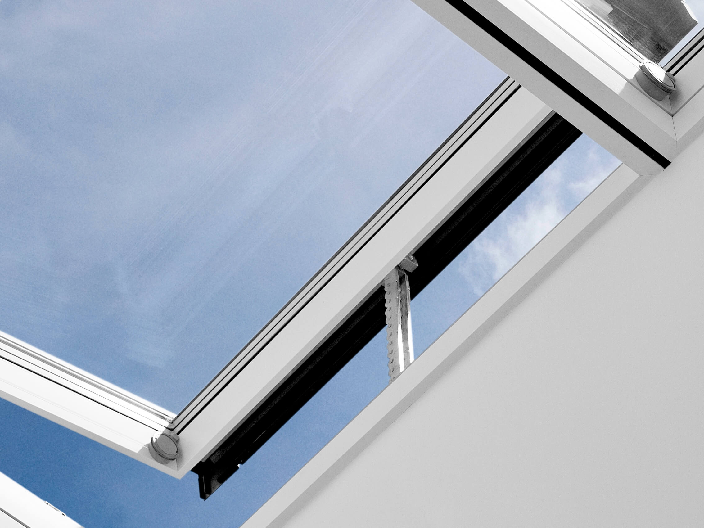 close up of open electrically operated VELUX modular skylight