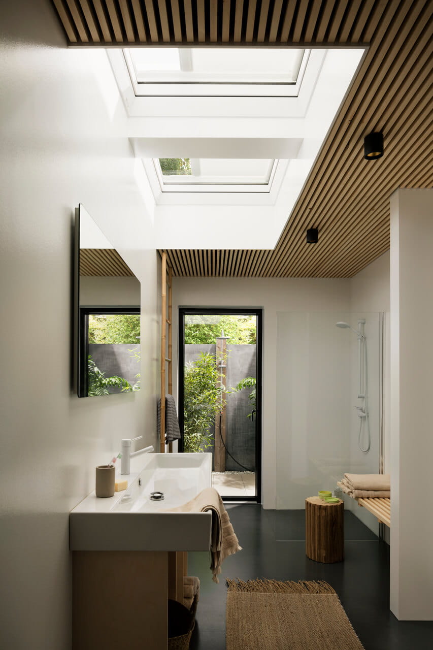 Bathroom image with 2 VELUX flat roof windows installed with blinds