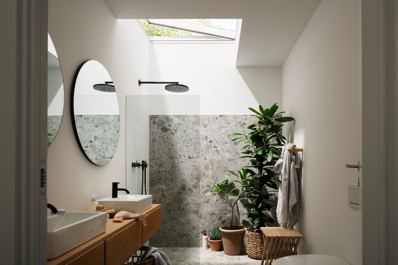A bright shower with a flat roof window