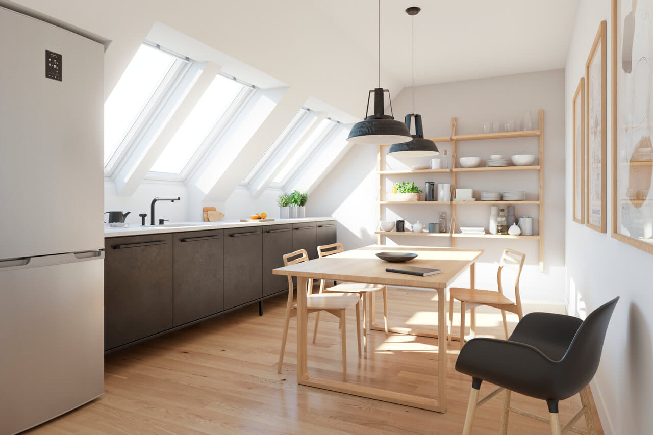 Sunny kitchen and dining room with three roof windows