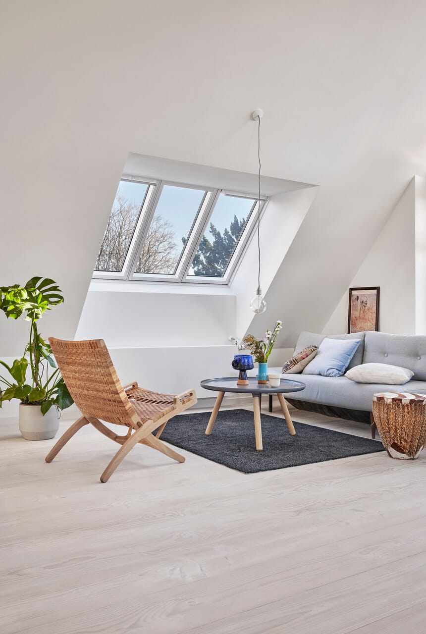 A bright living room with 3in1 roof window from VELUX