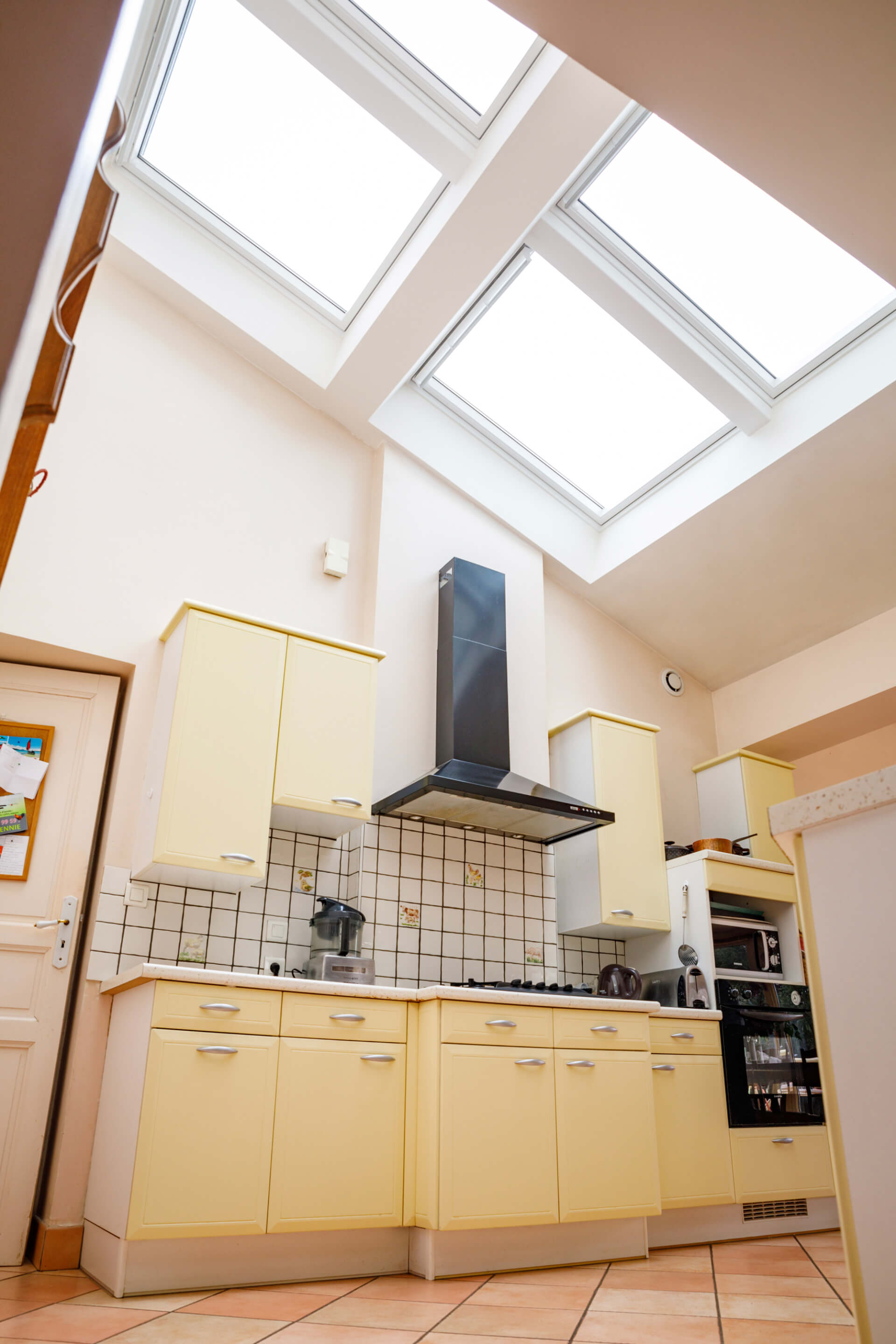 Bright kitchen interior with roof windows