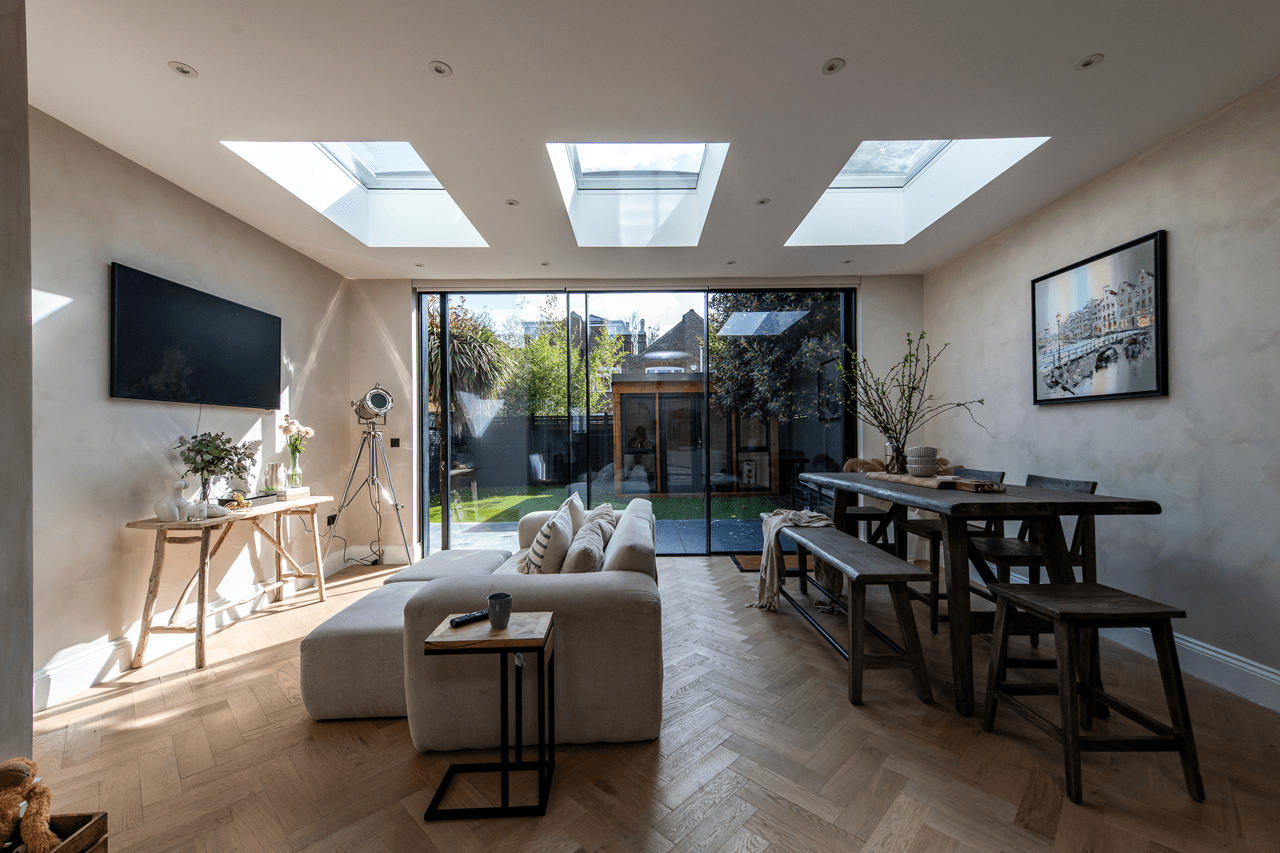 How to create a sun-drenched family-friendly space-view of the roof windows in room internally 