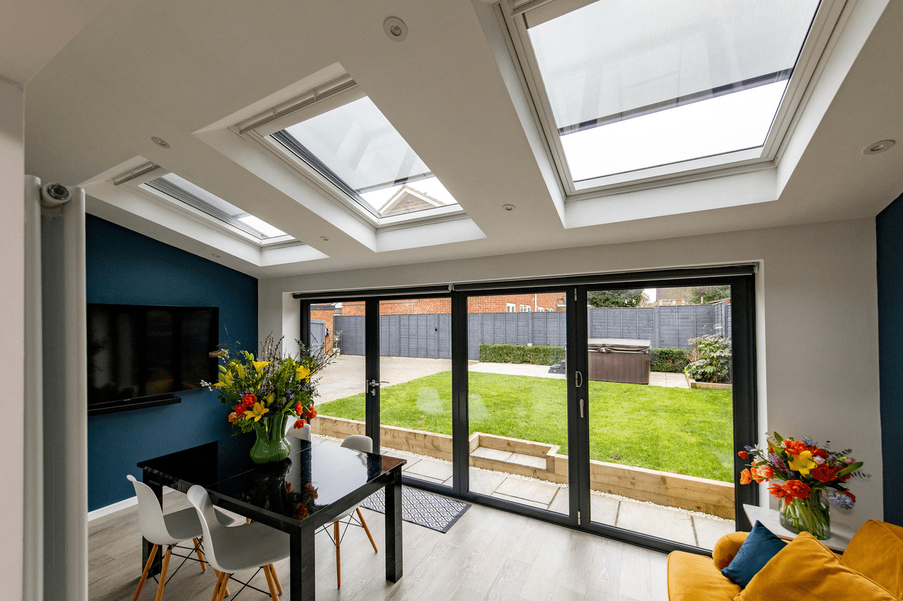 A multi-purpose space of possibilities-extension showing flat roof windows