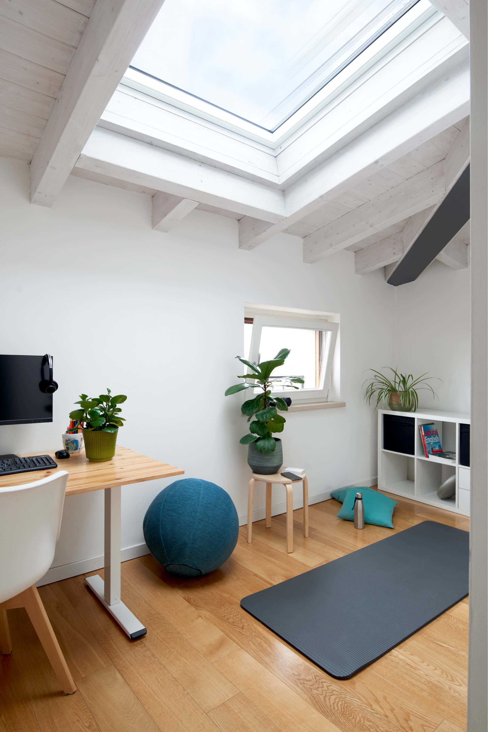 Home office space with a roof window