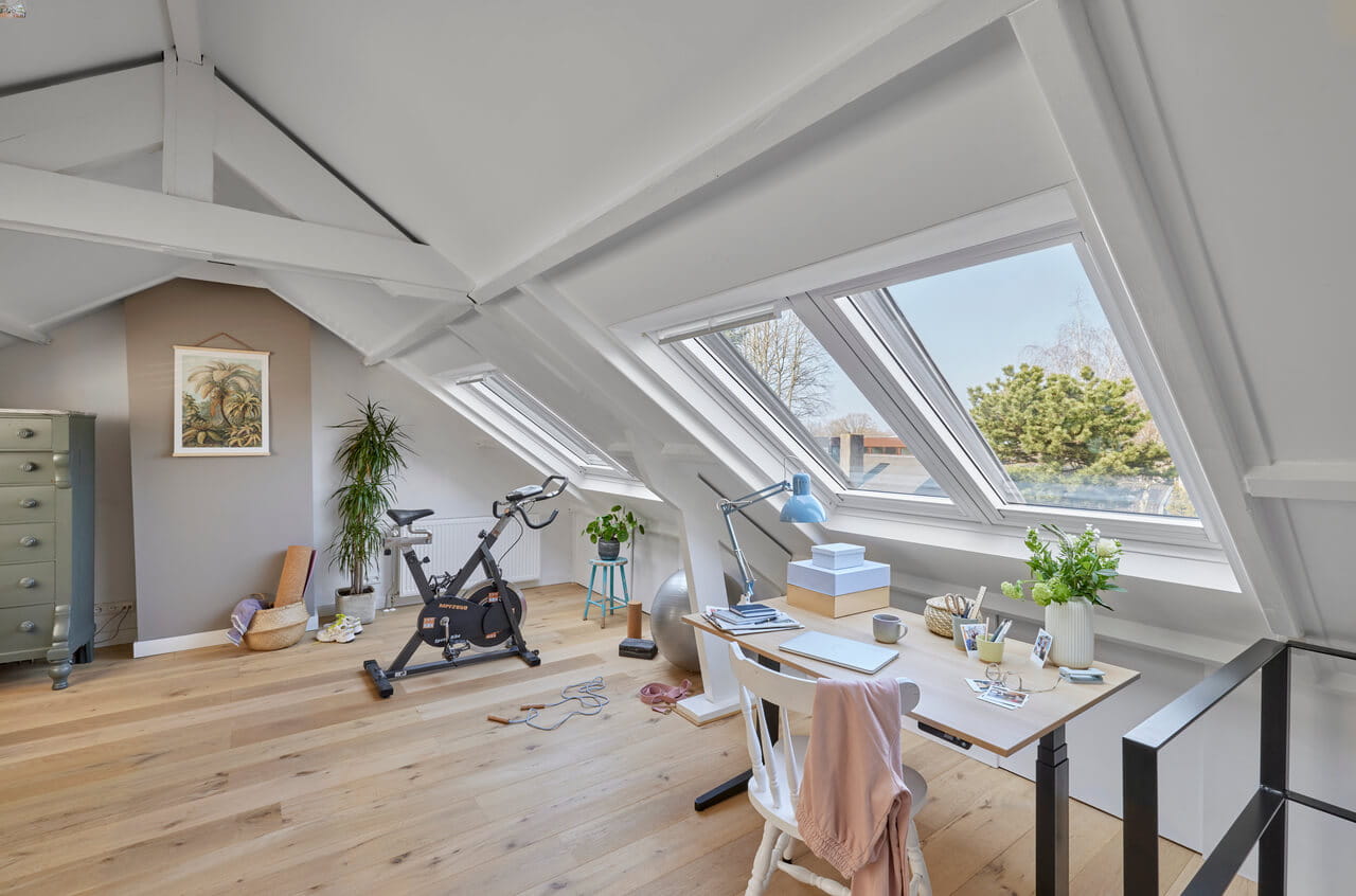 A bright attic with roof windows.